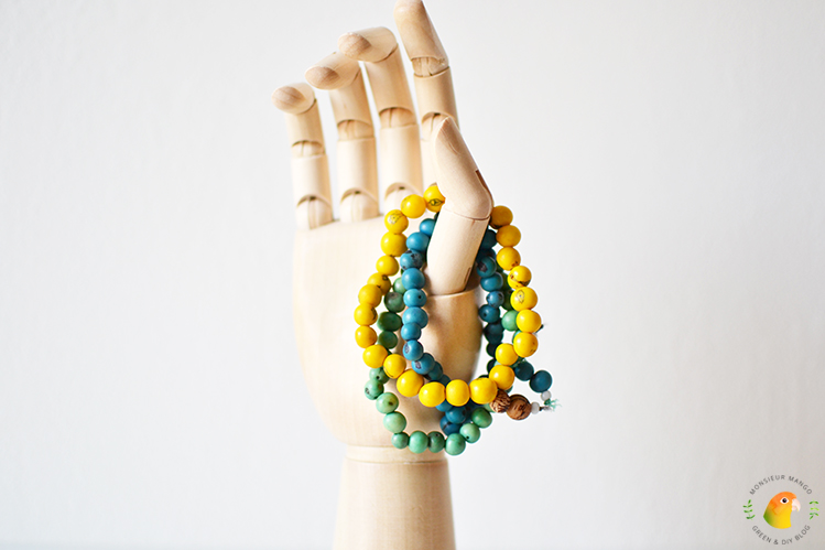 Afbeelding Freedom Beads in houten Hay hand